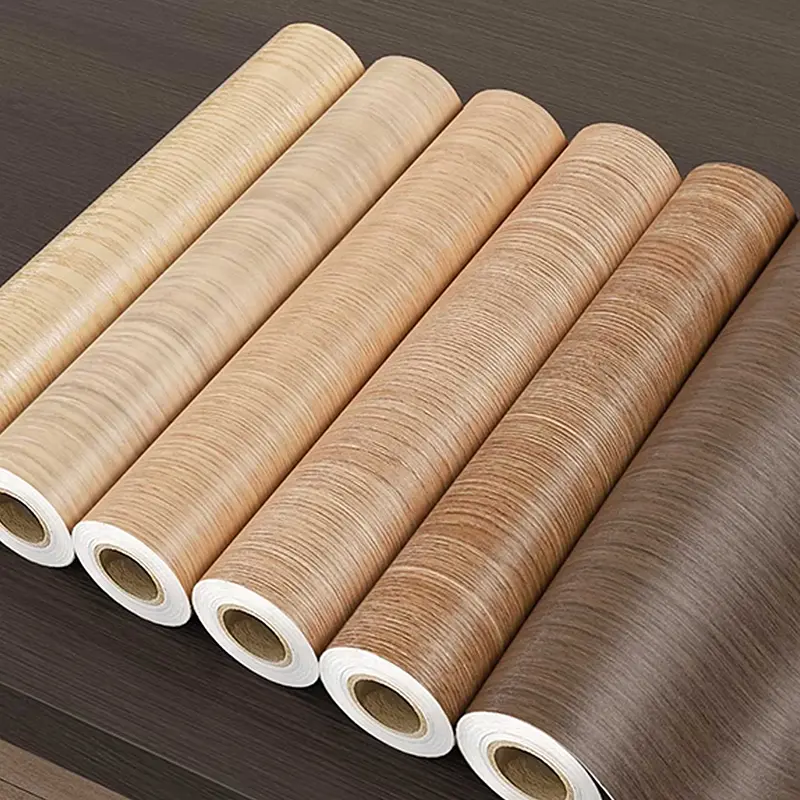 Amb la renovació d'habitatges ecològic en auge, per què les pel·lícules de gra de fusta de PET/PVC es converteixen en un nou favorit per a la decoració domèstica i comercial?